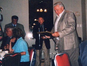 TOM McNEELEY RECEIVES AWARD