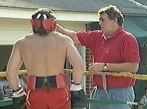 PETER McNEELEY GETS WATER FROM TRAINER BEAU WILLIFORD