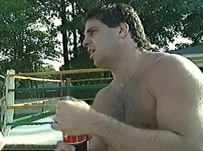 THE REAL THING - PETER McNEELEY COOLS OFF WITH A COKE AFTER WORKOUT