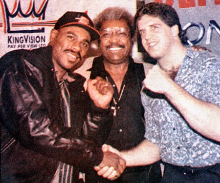 PROMOTER DON KING STANDS BETWEEN HEAVYWEIGHT BOXERS OLIVER McCALL AND PETER McNEELEY