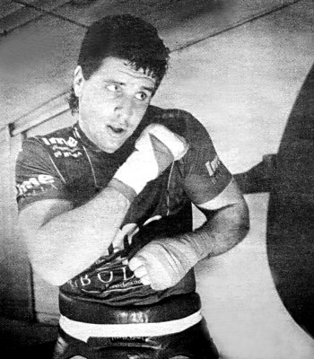 PETER McNEELEY WARMS UP IN THE GYM