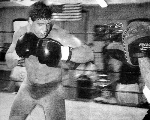 PETER McNEELEY WORKS OUT ON THE MITTS