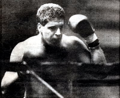 PETER McNEELEY STALKS HIS OPPONENT IN THE RING